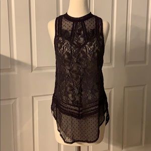 Lace eggplant sleeveless tunic length top.